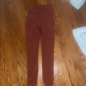 Lululemon rusty color leggings. Size 0